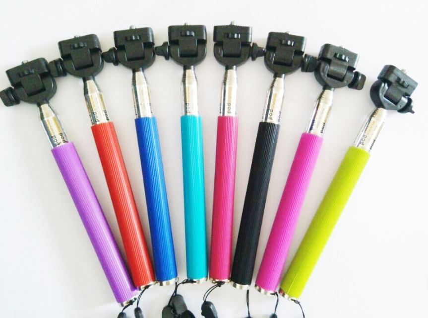 Extendable monopod tripod selfie stick with bluetooth shutter button